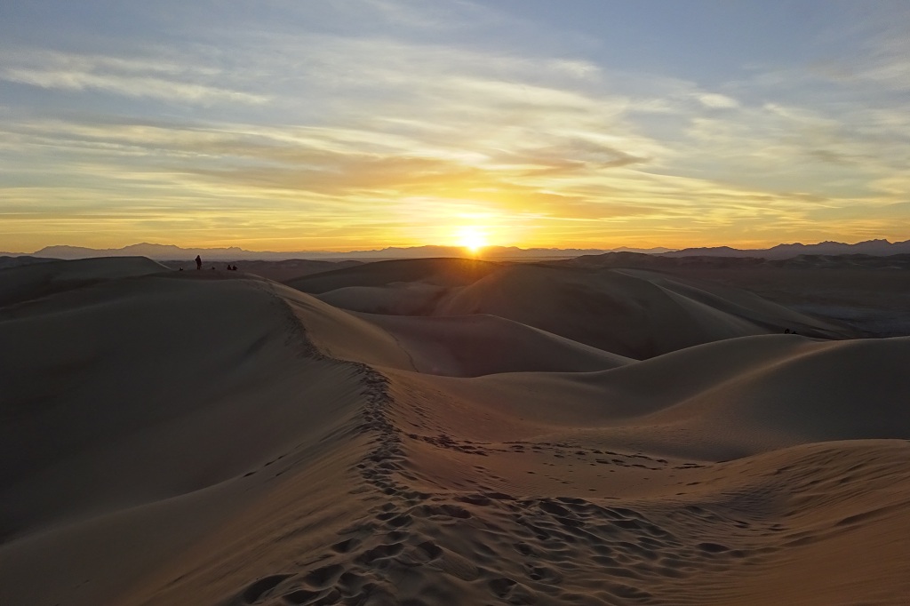 Sonnenuntergang über den Sanddünen